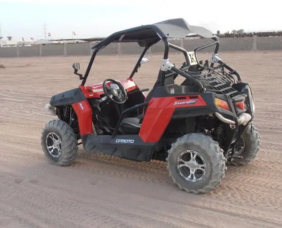 A red dune buggy ready to take off