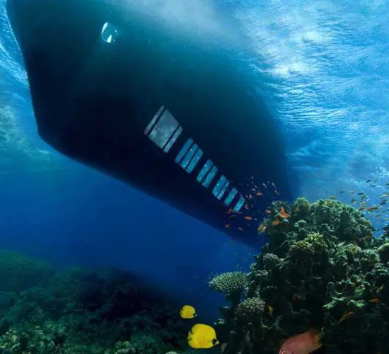 Colorful Red Sea coral reef and tropical fish seen through the large viewing windows of Sharm Blue Excursions semi-submarine adventure