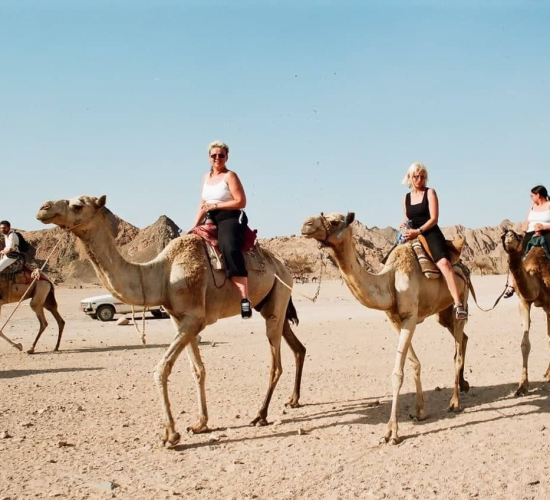 Girls enjoying the camel ride
