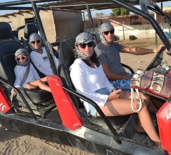 Family ready to take off into Sharm desert with their 4 seater buggy
